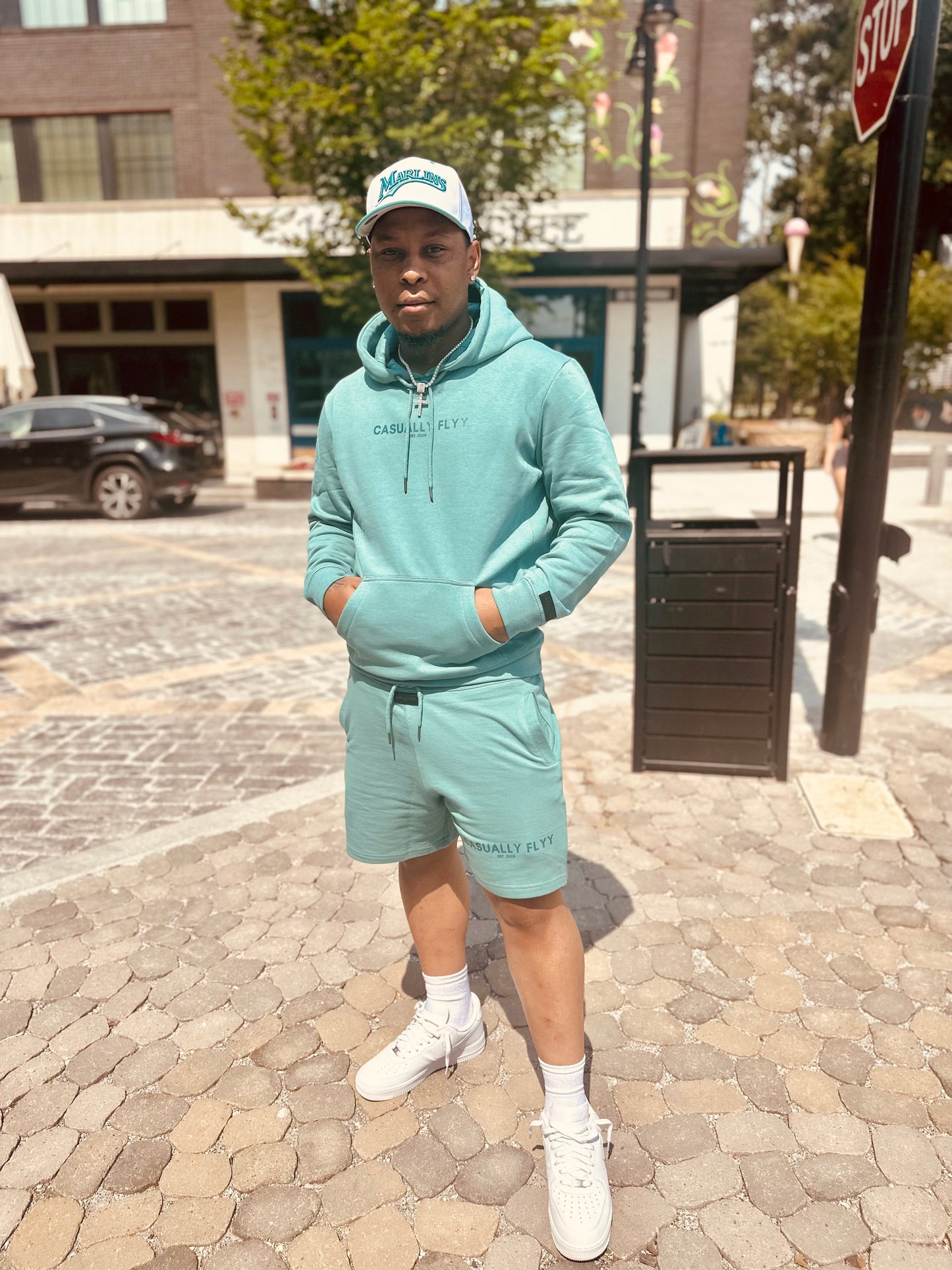 100% Cotton Hoodie & Short Color Aqua Stay fresh and comfy with this 100% cotton hoodie & short set! It's the perfect two-in-one outfit for lounging around, getting your workout in, or just living your best life. Mix & match; the possibilities are endless.