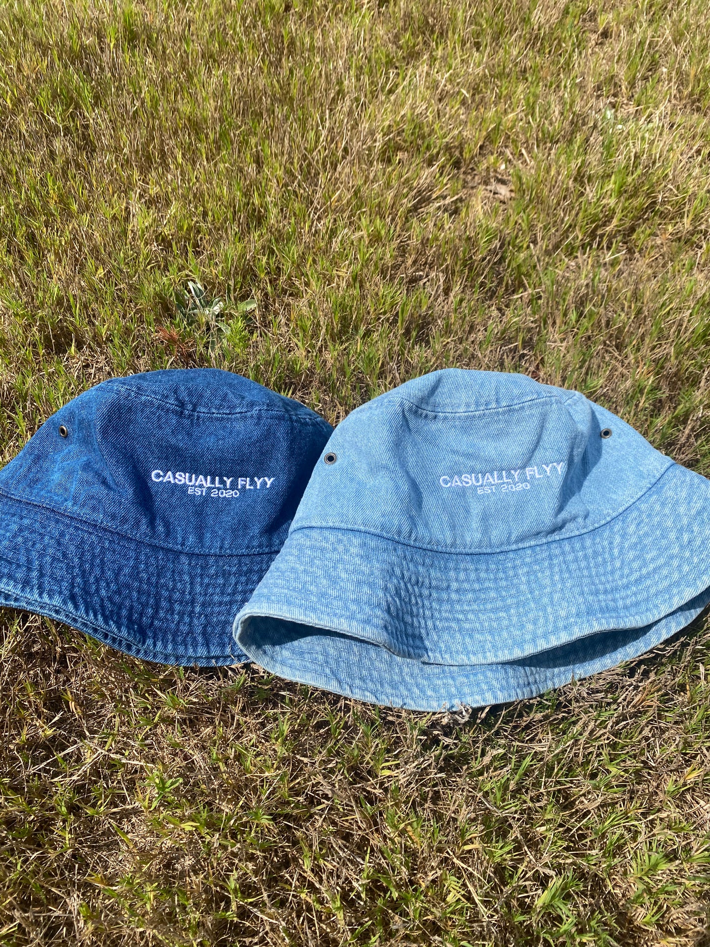 Our CF Bucket Hats are the perfect addition to your outfit! The collection comes in two colors, Light & Dark Wash Denim with our classic design that will show off your signature style. Whether you want to dress up or dress down, these hats will provide the perfect finishing touch to make you look and feel Casually Flyy!